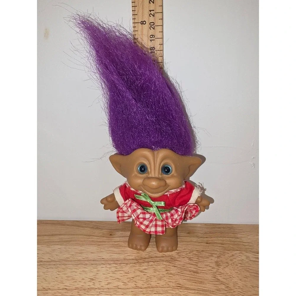 vintage Ace Novelty Treasure Troll doll featuring purple hair, blue eyes